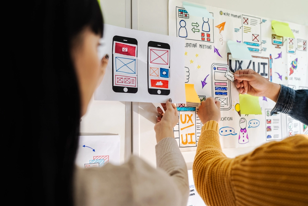An image showing how a team create an app to give a intuitive user experience with attractive design.