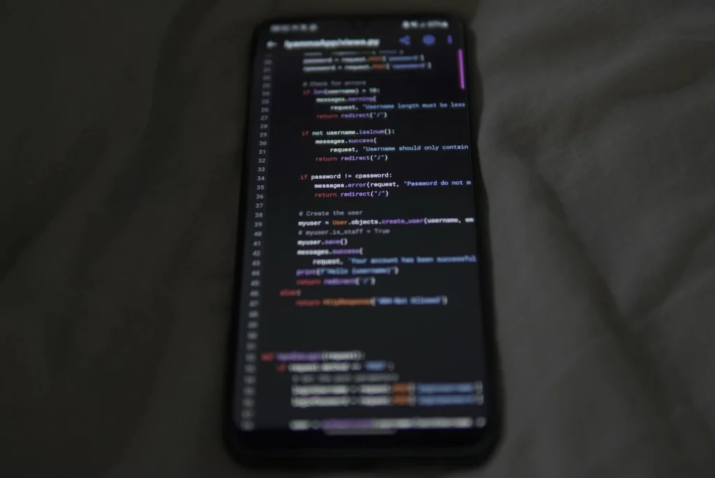 Mobile app development code on smartphone for Flutter e-commerce apps